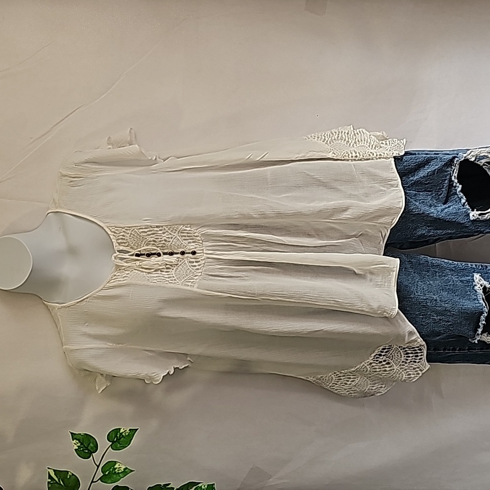 World Unity Asymmetrical Hemline Top.